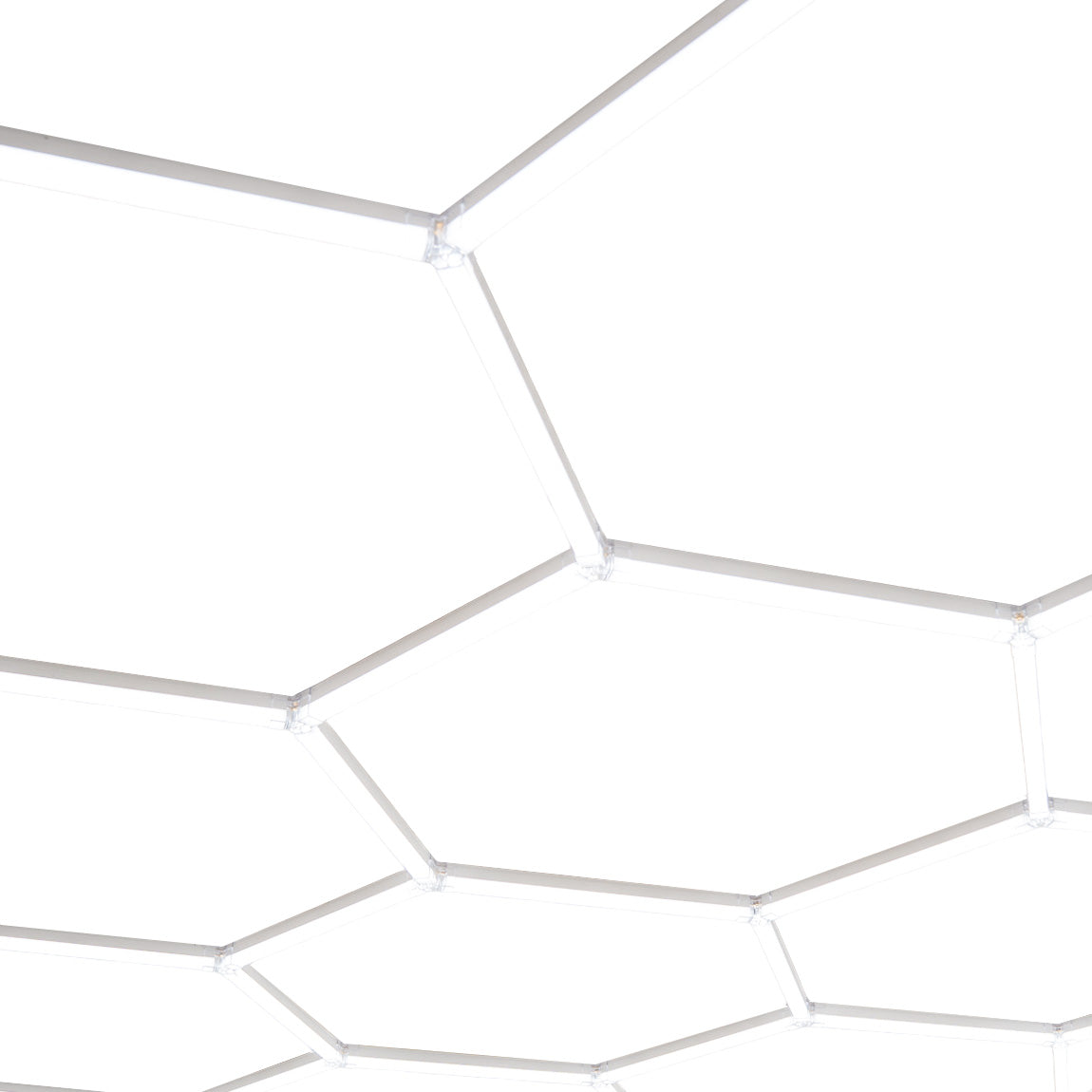 Zehn hexagonale LED-Leuchten in modernem Design, aus weißem Material mit glatter Oberfläche, ideal für kreative Raumgestaltungen