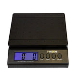 Digitale Postwaage T-Mech mit schwarzer, rutschfester Plattform, blauer LCD-Anzeige und Tasten für Tara, Einheit und Ein/Aus, max. 30 kg