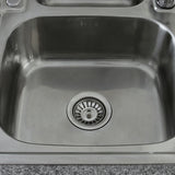 Edelstahl Einbauspüle mit glänzender Oberfläche, runder Abfluss und modernem Design, ideal für Küchen mit stilvollem Confetti Wasserhahn