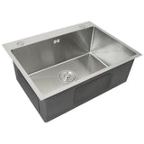 Edelstahl Küchenspüle mit rechteckiger Form, glänzender Oberfläche, abgerundeten Kanten und einem zentralen Abfluss, ideal für moderne Küchen