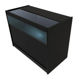 Schwarze LED-Ladentheke mit gläserner Oberseite, modernem Design und sanfter Beleuchtung, ideal für Verkaufsräume und Ausstellungen