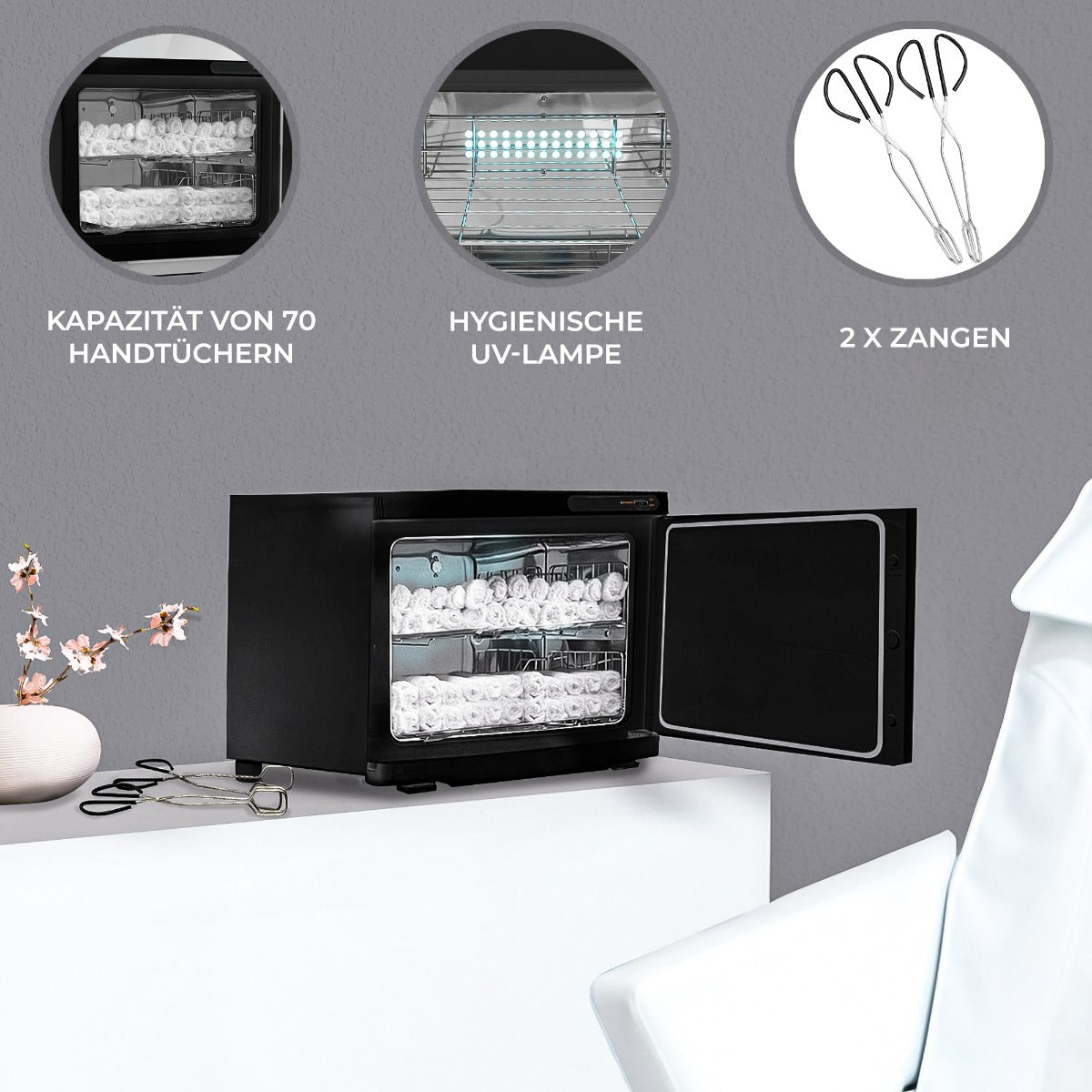 Schwarzer Handtuchwärmer mit Platz für 70 Handtücher, ausgestattet mit einer hygienischen UV-Lampe und zwei Zangen, ideal für Wellness und Spa