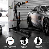 Schwarzer Werkstattkran mit orangefarbenem Jib, robusten Rädern und klappbaren Beinen, ideal für das Heben von Motoren bis 1000 kg