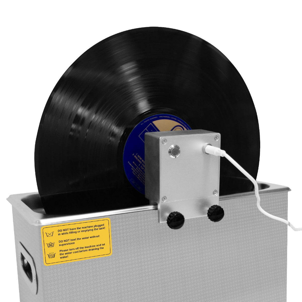 Ultraschall-Schallplattenreiniger in silberner Box mit schwarzer Schallplatte, die auf einem stabilen Halter rotiert, Kabelanschluss sichtbar
