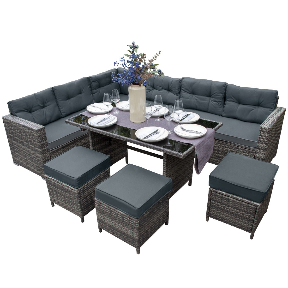 Elegantes Polyrattan Gartenmöbel Set in Grau mit bequemen Kissen, einem Glastisch und stilvollen Accessoires für entspannte Außenbereiche