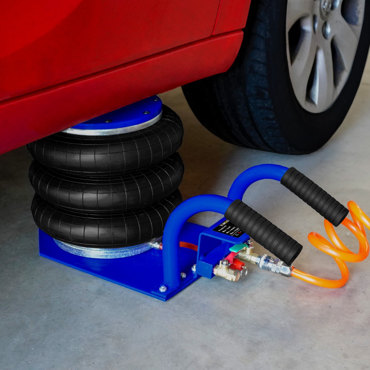 Pneumatischer Wagenheber mit drei schwarzen Gummibälgen, blauen Schläuchen und einer stabilen Basis, ideal für Autos bis 3,5 Tonnen