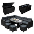 Schwarze Rattan Eckgarnitur mit bequemen, grauen Kissen, dazu eine praktische Kissenbox und ein eleganter Tisch, ideal für den Außenbereich