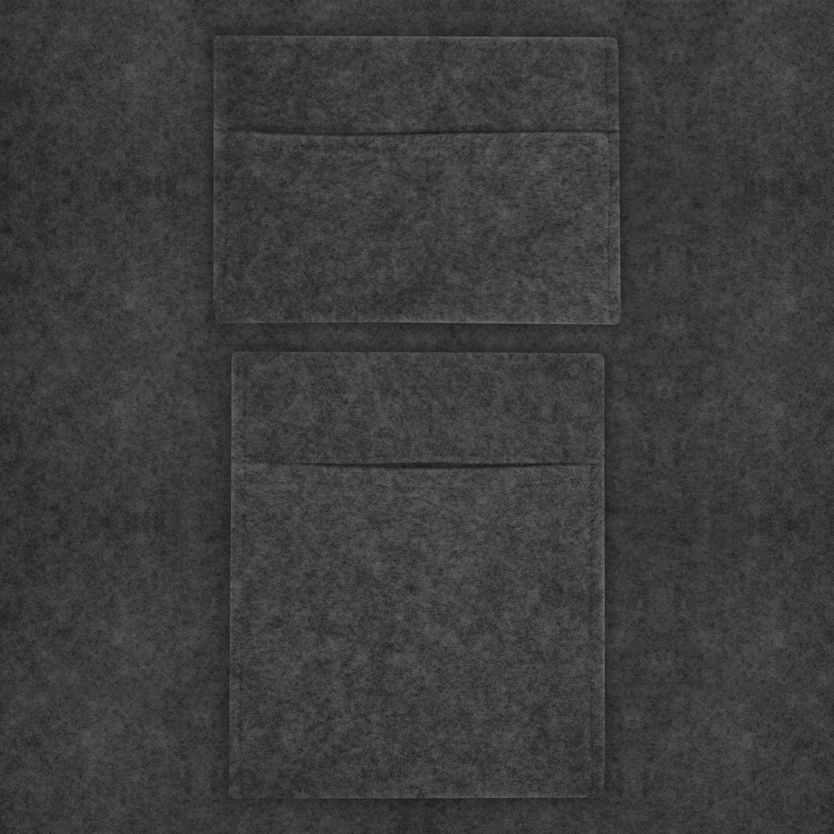 Anthrazitgrauer Autostoff mit zwei praktischen Aufbewahrungstaschen, weiche Textur und modernes Design für eine stilvolle Innenausstattung