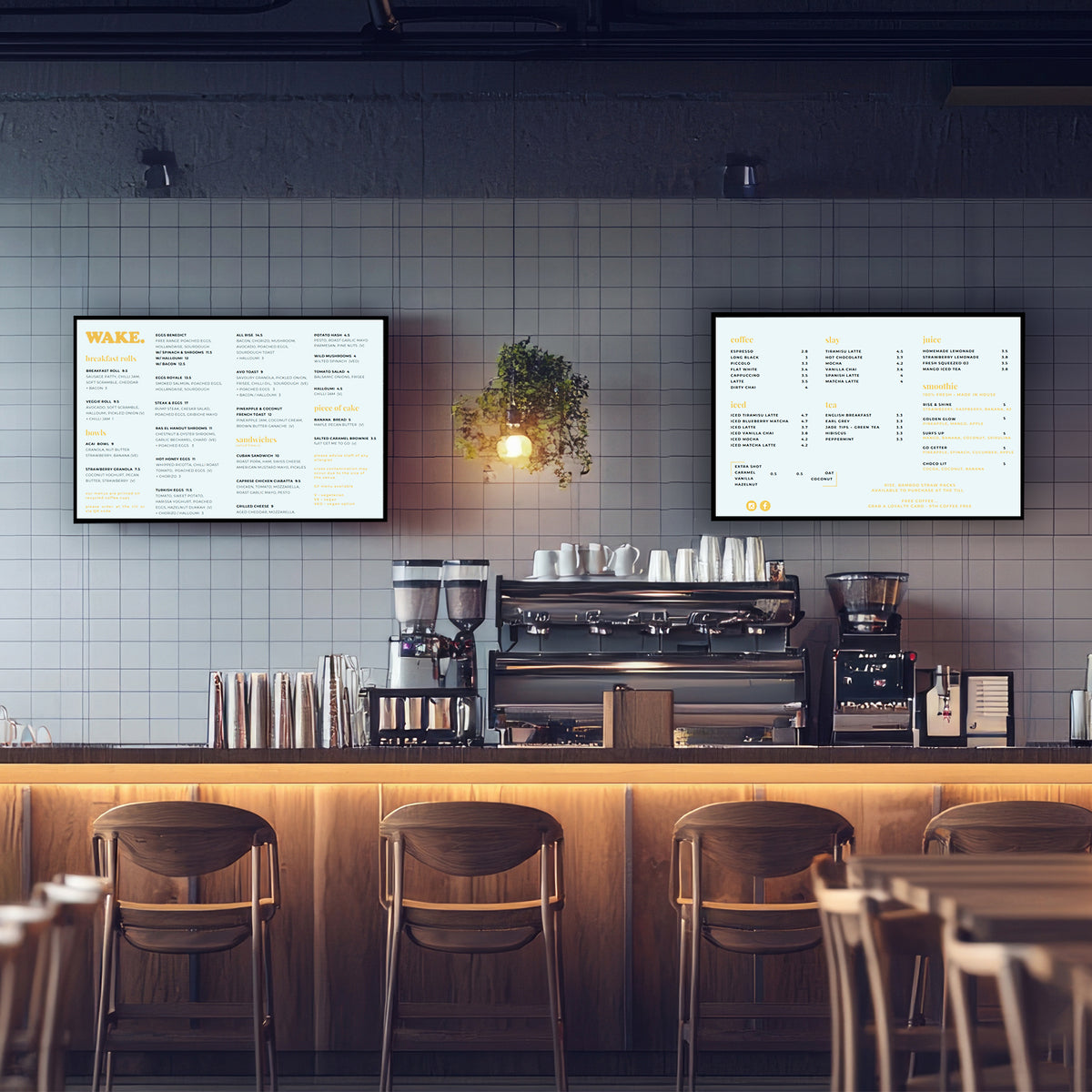 Zwei LED-Leuchtrahmen im DIN A2-Format an einer grauen Wand, präsentieren ein Menü in klarer Schrift, umgeben von einem modernen Café-Ambiente
