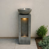Elegante elektrische Wasseranlage "Serenity Falls" aus grauem Beton mit sanft fließendem Wasser und sanfter Beleuchtung, ideal für Garten oder Terrasse