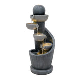 Elegante elektrische Wasseranlage "Spiral Springs" aus schwarzem Stein mit mehreren Wasserbecken und sanft fließendem Wasser, ideal für Garten oder Terrasse