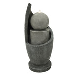 Elegante elektrische Wasseranlage "Zen Cascade" aus grauem Stein, mit geschwungenen Formen und einer sanften Wasserfontäne, die Ruhe ausstrahlt