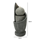 Elegante elektrische Wasseranlage "Zen Cascade" aus grauem Stein, mit geschwungenen Formen, einer runden Kugel und gestapelten Zylindern, 65 cm hoch, 34 cm breit