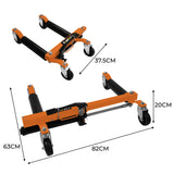 Hydraulische Positionierungsschlitten in Orange und Schwarz, mit robusten Rollen, verstellbarer Länge von 63 cm bis 82 cm und einer Höhe von 20 cm, ideal für präzise Bewegungen