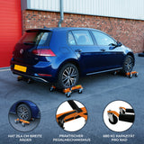 Hydraulische Positionierungsschlitten in orange und schwarz, unter einem blauen Volkswagen, mit 25,4 cm breiten Rädern und 680 kg Kapazität pro Rad