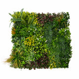 Künstliche Wandfliese in lebendigen Grüntönen mit verschiedenen Pflanzenarten, darunter Farne und Blüten, ideal für dekorative Akzente