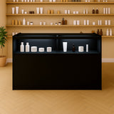 Schwarze LED-Ladentheke mit zwei offenen Regalen, ideal für die Präsentation von Kosmetik- und Pflegeprodukten in einem modernen Verkaufsraum