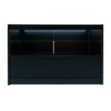 Schwarze LED-Ladentheke mit glatter Oberfläche, beleuchtetem oberen Regal und geräumigem Stauraum, ideal für moderne Verkaufsräume