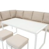 Elegantes 5-teiliges Ecksofa-Set aus Aluminium in Weiß mit beigen, gepolsterten Kissen und einem modernen, klaren Glastisch