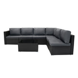 Schwarzes Rattan-Modular-Möbelset mit grauen Kissen, bestehend aus einer L-förmigen Couch und einem niedrigen Tisch, ideal für den Außenbereich