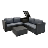 Modulares 6-teiliges Rattan-Möbelset in Schwarz mit grauen Kissen, bestehend aus einer L-förmigen Couch und einem Tisch mit Stauraum