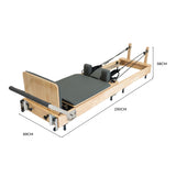 Pilates Reformer Maschine aus Eiche mit grauem Polster, verstellbaren Gurten und stabiler Bauweise, ideal für effektives Training zu Hause