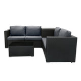 Modulares 6-teiliges Rattan-Möbelset in Schwarz mit grauen Kissen, bestehend aus einer L-förmigen Couch und einem Couchtisch mit Aufbewahrungsbox