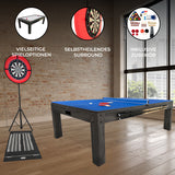 Grauer 7-in-1 Spieltisch mit LED-Ringlicht, vielseitigen Spieloptionen und Zubehör, präsentiert in einem modernen Raum mit Backsteinwand