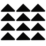 Schwarze, dreieckige Gummihammer-Pads in einer 3x4-Anordnung, ideal für die Monster Racking Galwix Werkbank zur Verbesserung der Stabilität und Sicherheit