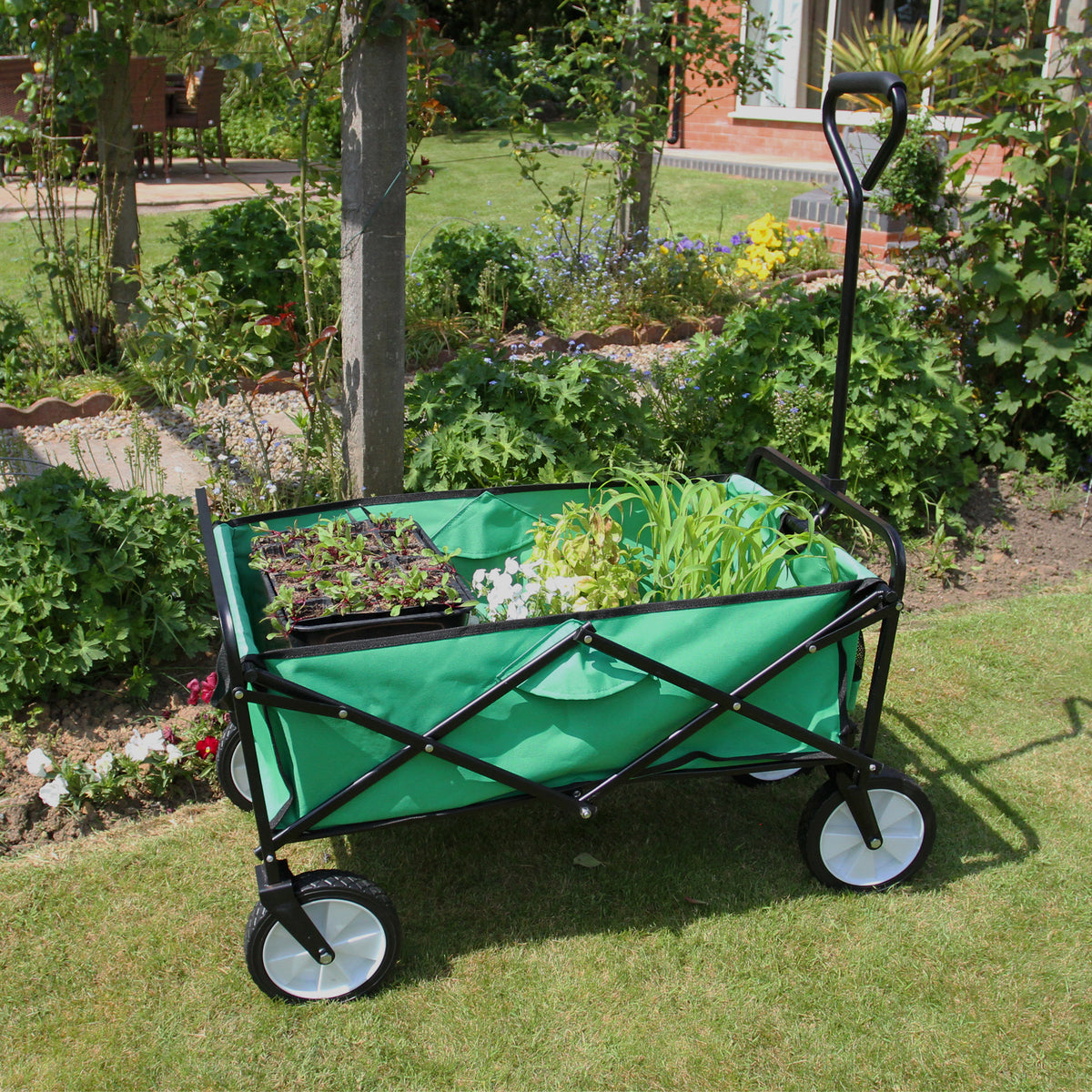 Faltbarer Gartenwagen in leuchtendem Grün mit stabiler schwarzer Rahmenstruktur, ausgestattet mit großen Rädern und Platz für Pflanzen und Gartenzubehör