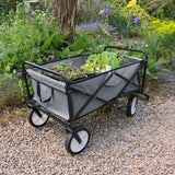 Faltbarer Gartenwagen in Grau mit robustem Gestell, weichem Innenfutter und großen, stabilen Rädern, ideal für Gartenarbeit und Transport von Pflanzen