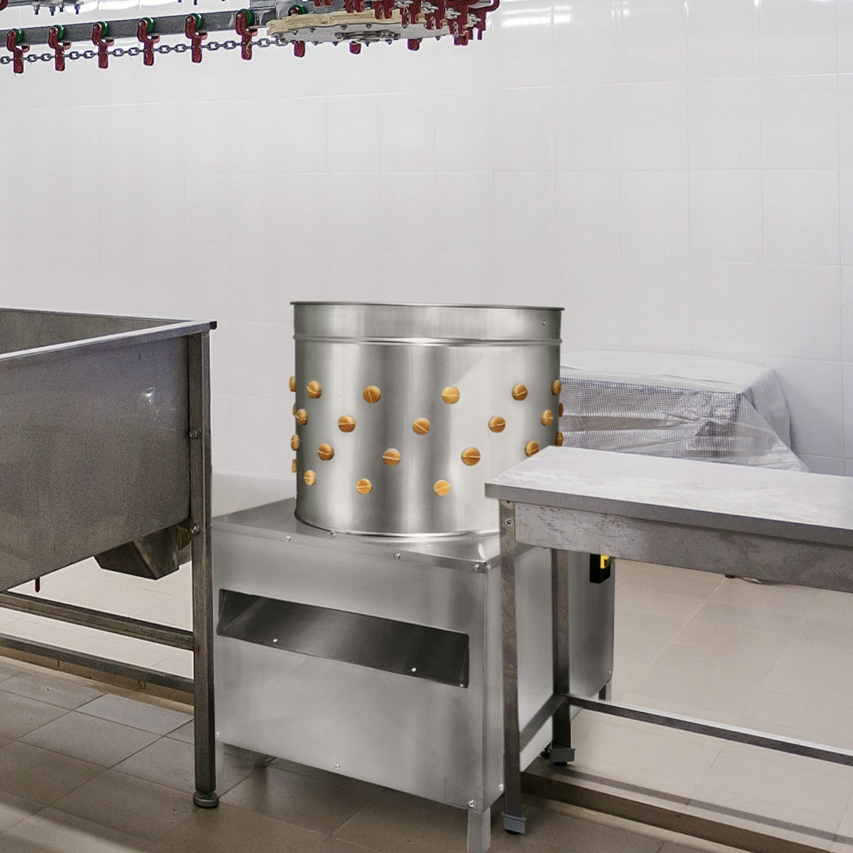 Hochwertige KuKoo 60cm Geflügelrupfmaschine aus Edelstahl mit runder Trommel, ausgestattet mit Löchern für effizientes Rupfen von Geflügel