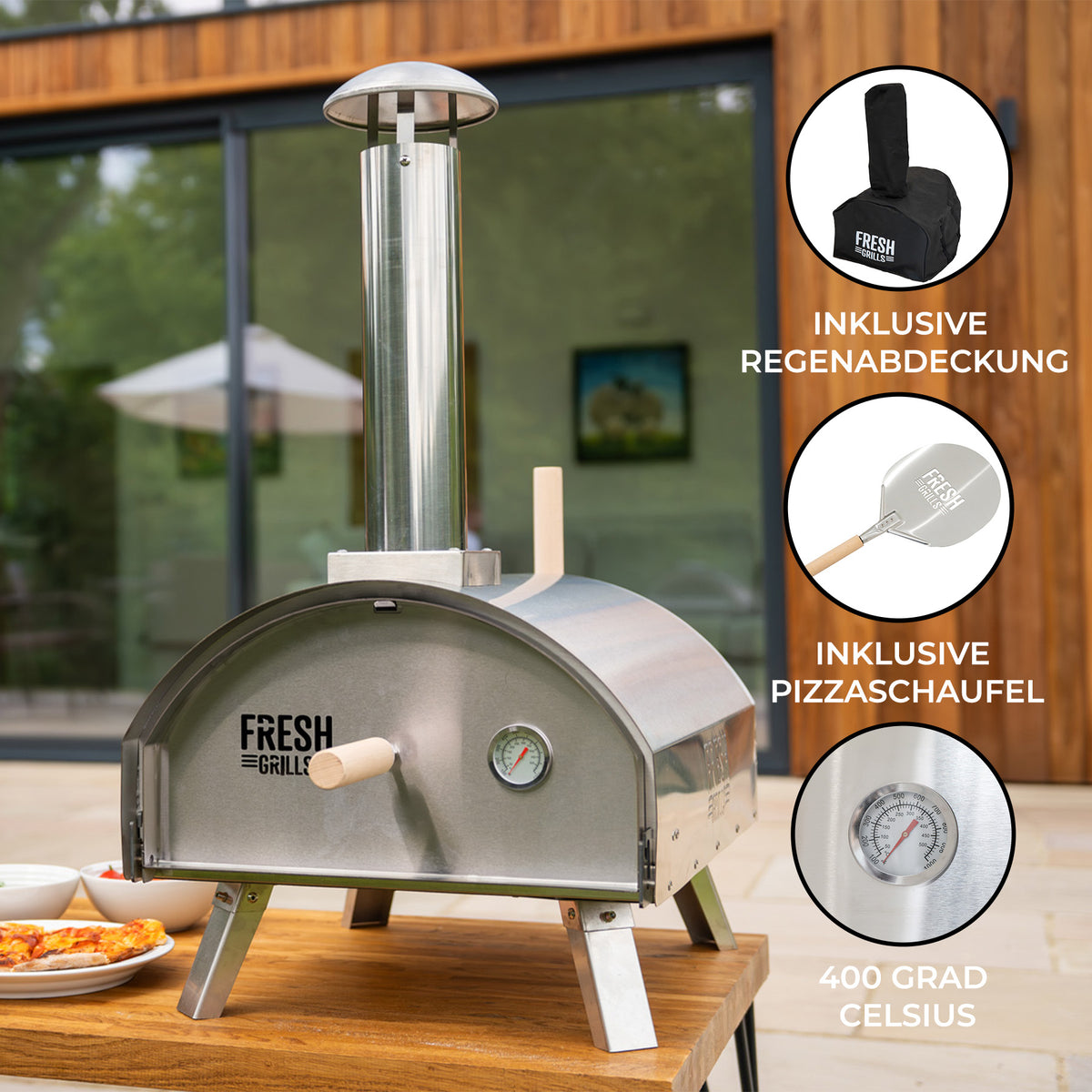 Der Premium Outdoor-Pizzaofen aus Edelstahl hat eine glänzende Oberfläche, einen hohen Schornstein und eine Temperaturanzeige, ideal für perfekte Pizzas im Freien