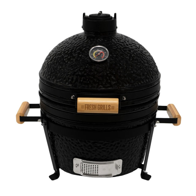 Schwarzer Kamado-Ofen aus Keramik mit Holzgriffen, runder Form, Temperaturanzeige und robustem Grillrost, ideal für Holzkohlegrillliebhaber