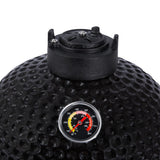 Schwarzer Kamado-Ofen mit glänzender, strukturierter Oberfläche und Temperaturanzeige, ideal für Holzkohlegrillliebhaber