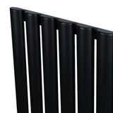 Schwarzer Gliederheizkörper mit TRV Chromventilen, 600mm x 1200mm, zeigt schlanke, runde Röhren und eine matte Oberfläche für modernes Design