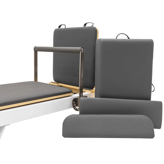Moderne, verstellbare Liege mit grauem, gepolstertem Bezug und Holzrahmen, ideal für Wellness- und Fitnessanwendungen