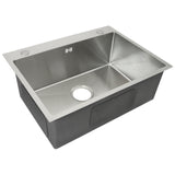 Edelstahl Küchenspüle mit rechteckiger Form, glänzender Oberfläche, abgerundeten Kanten und einem zentralen Abflussloch, ideal für moderne Küchen