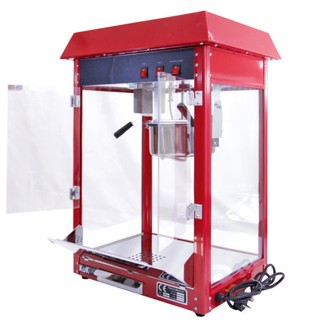 Retro Popcornmaschine in leuchtendem Rot mit transparenten Seiten, glänzender Oberfläche, und einem praktischen Bedienfeld für einfaches Popcornzubereiten