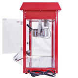 Retro Popcornmaschine in leuchtendem Rot mit transparentem Gehäuse, glänzender Edelstahlwanne und schwarzem Griff, ideal für frisches Popcorn
