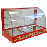 Rote KuKoo Vitrine mit gebogenem Glas, drei Edelstahlbehältern und verstellbaren Drahtregalen, ideal für die Präsentation von Speisen in Gastronomiebetrieben