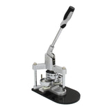 Robuste PixMax 58mm Button Presse aus silbernem Metall mit schwarzem Standfuß, ideal zum Herstellen von Abzeichen und Buttons in verschiedenen Designs
