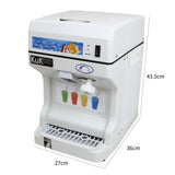 Die KuKoo Slush Eismaschine in Weiß mit blauen Akzenten, kompakt und modern, ideal für die Zubereitung von gefrorenen Getränken und Slushies