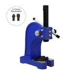 Robuste T-Mech Dornpresse in leuchtendem Blau mit stabiler Basis, verstellbarem Handgriff und zwei kostenlosen Stanzeinsätzen im Hintergrund