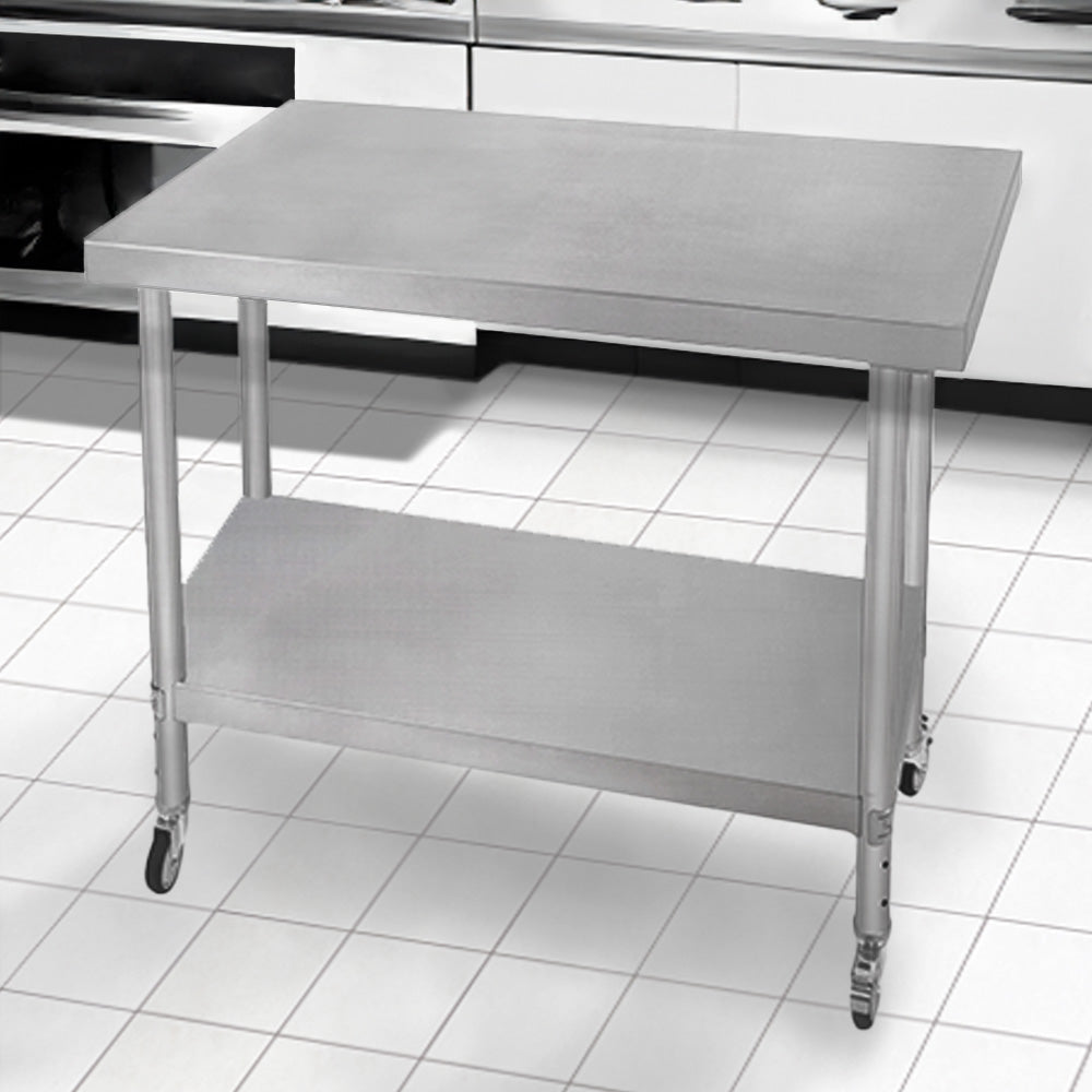 Robuster Edelstahl-Arbeitstisch mit den Maßen 76cm x 90cm x 86cm, glatte Oberfläche, zwei Ebenen und Rollen für einfache Mobilität