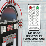 Retro Jukebox in Rot und Silber mit glänzenden Oberflächen, ausgestattet mit einer praktischen Fernbedienung zur Steuerung von Musik und Beleuchtung