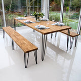Schwarze 71 cm hohe Hairpin Tischbeine mit zwei Streben, elegant und stabil, perfekt für moderne Holztische in einem hellen Raum