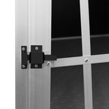 Kleine Hundetransportbox aus leichtem Aluminium mit stabilen Gittertüren, schwarzem Schloss und rutschfester Bodenmatte für Sicherheit und Komfort